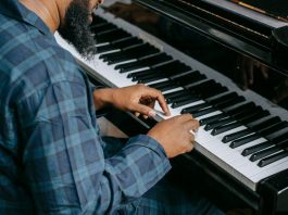9 Famous Black Composers That Had a Huge Impact on the Music Industry Man playing a piano