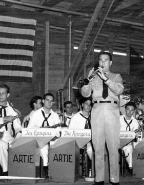 Famous clarinet player Artie Shaw performing on stage