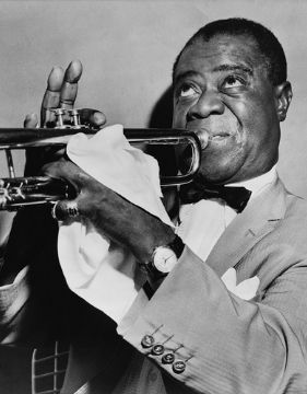 Louis Armstrong playing the trumpet