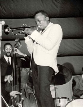 A picture of Miles Davis, a famous trumpet player