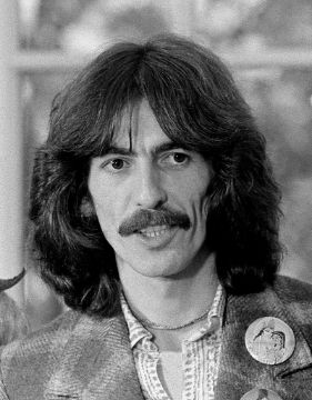 Black and white photo The Beatles guitarist George Harrison