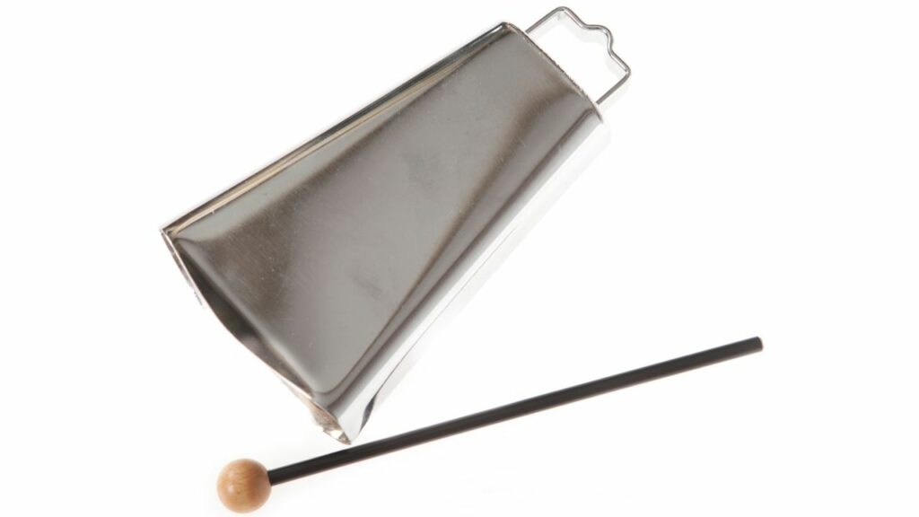 Cowbell and a mallet on a white background