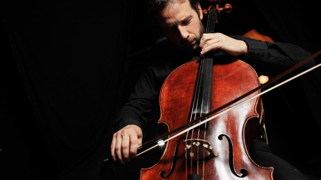 A musician playing a cello.