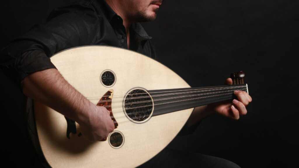 A musician playing an oud