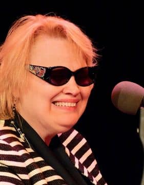Photo of famous blind piano player, Diane Schuur