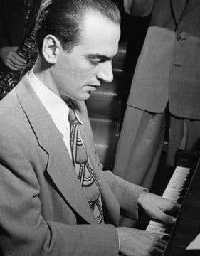 photo of Lennie Tristano playing the piano