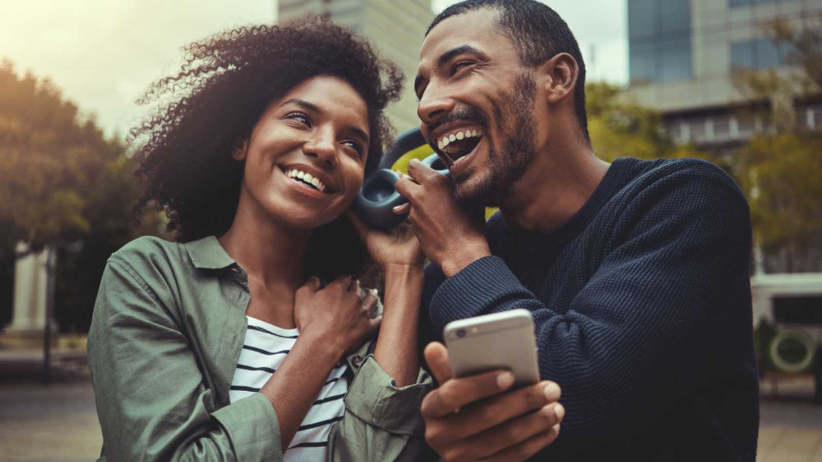 Couples Listening To Music Outdoors