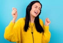 Happy Woman Hearing Music