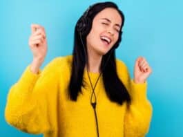 Happy Woman Hearing Music