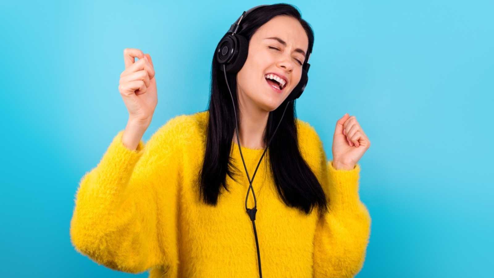 Happy Woman Hearing Music