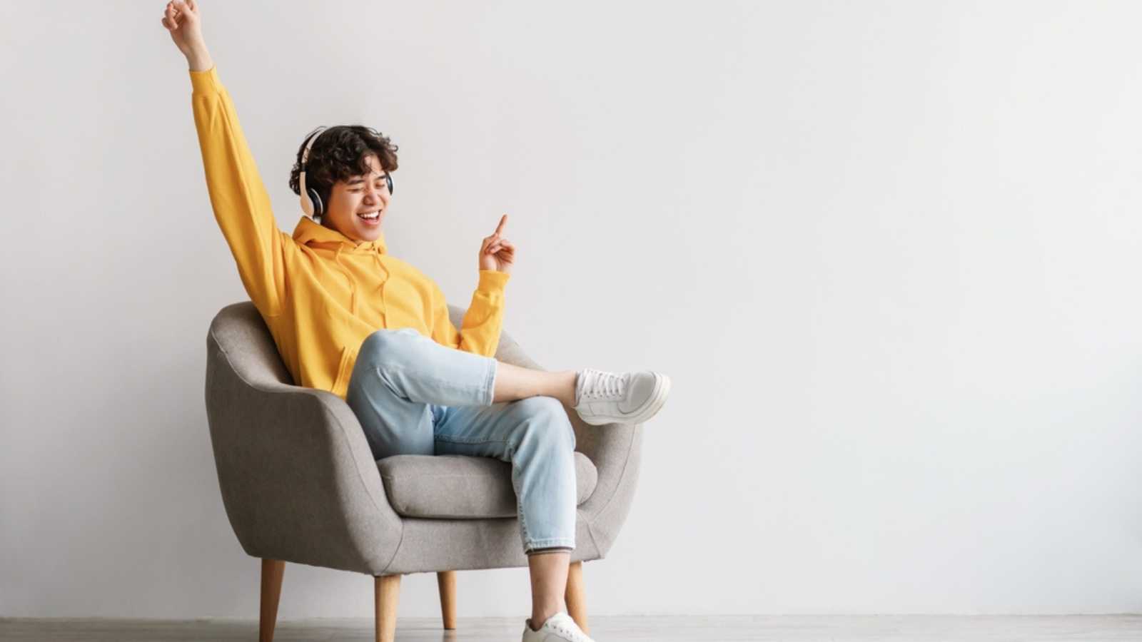 Man Sitting With Headphones