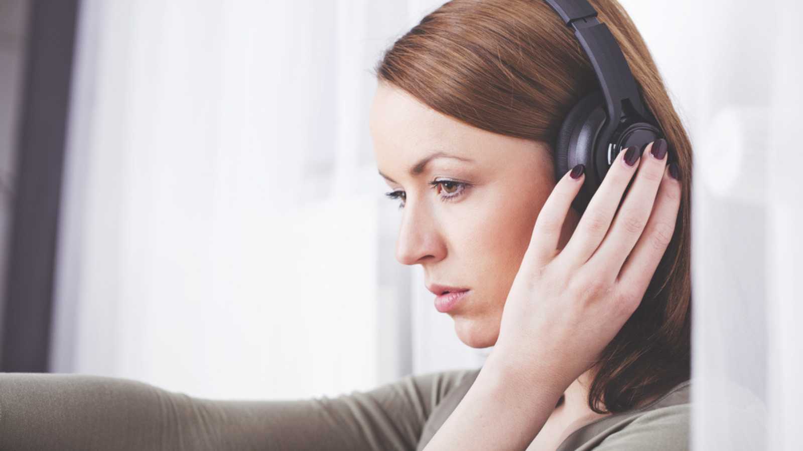 Sad Woman Listening To Music