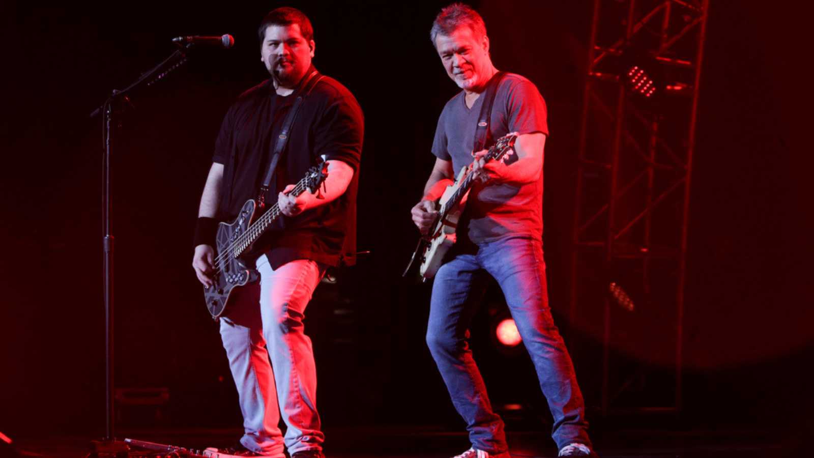 WANTAGH, NY-AUG 14: Eddie Van Halen (R) and son Wolfgang Van Halen of Van Halen perform onstage at Jones Beach Theater on August 14, 2015 in Wantagh, New York.