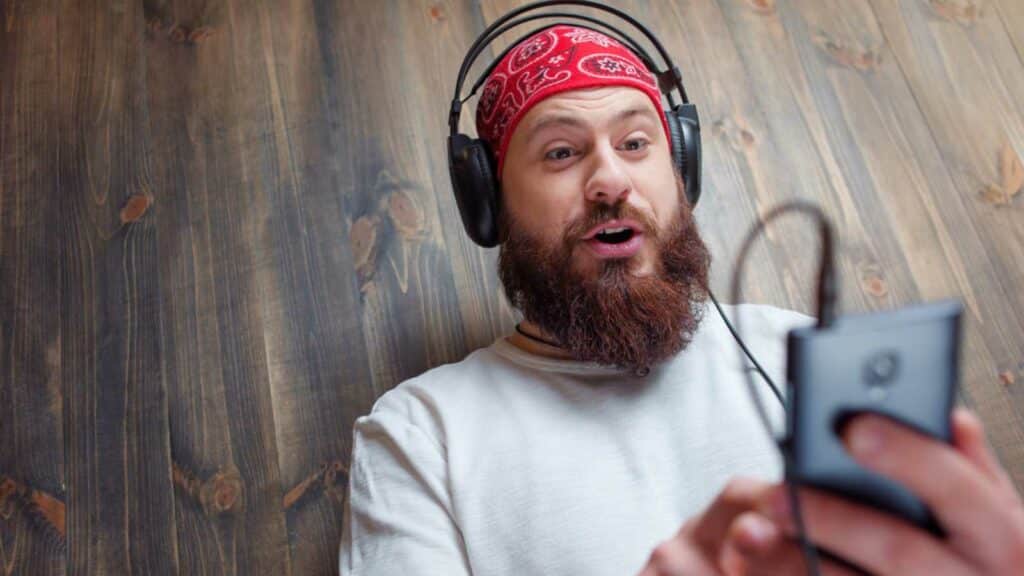 Man Hearing Rock Music