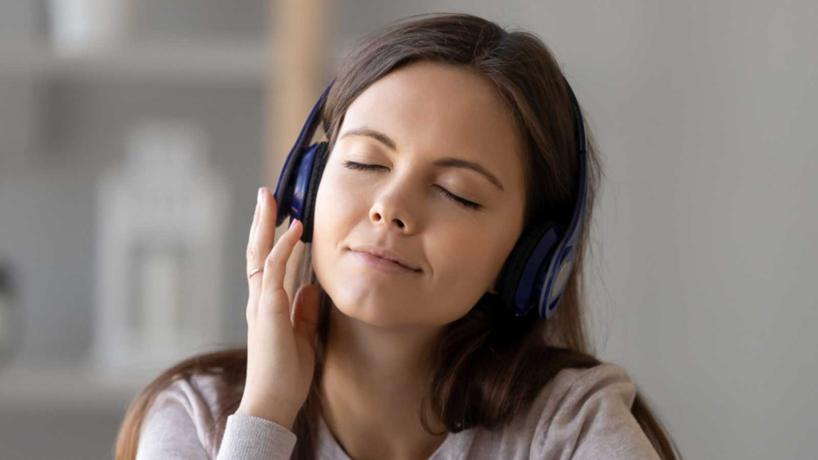 Woman Hearing Pop Song