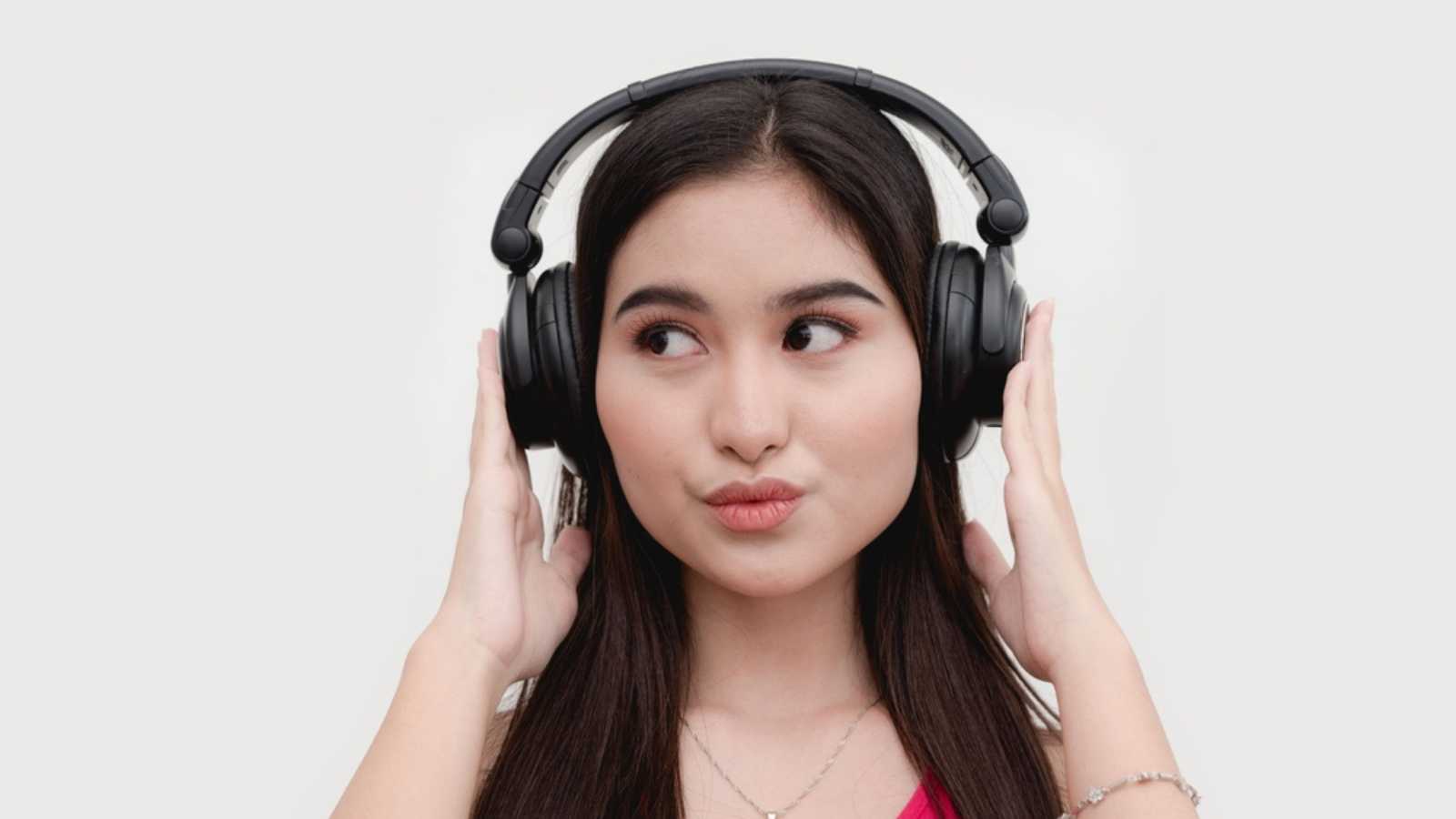 Woman Hearing Pop Song With Headphone