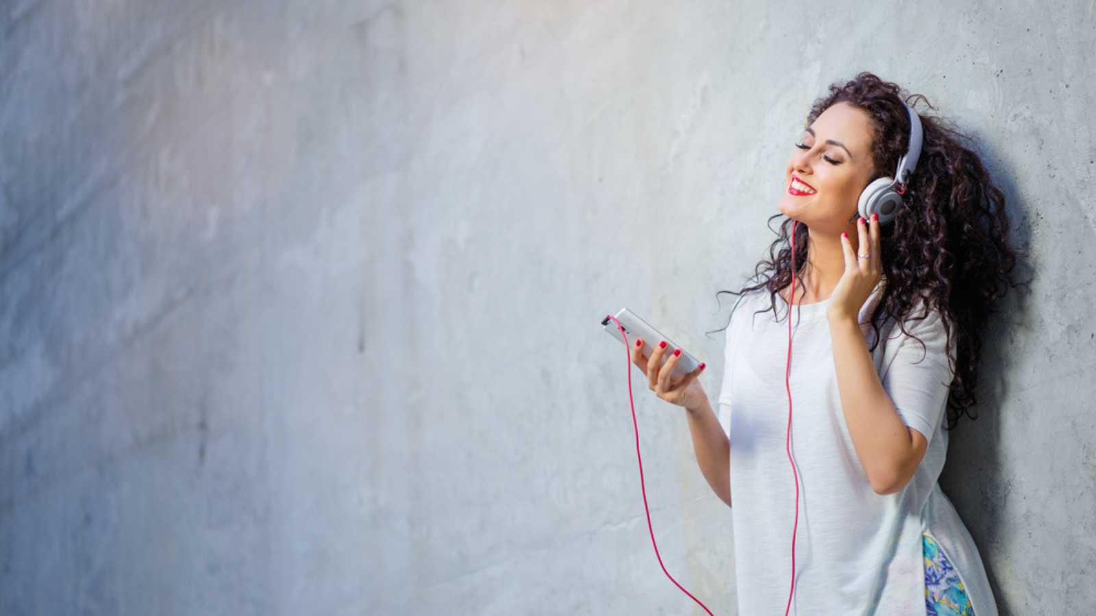 Woman Hearing Rock Music