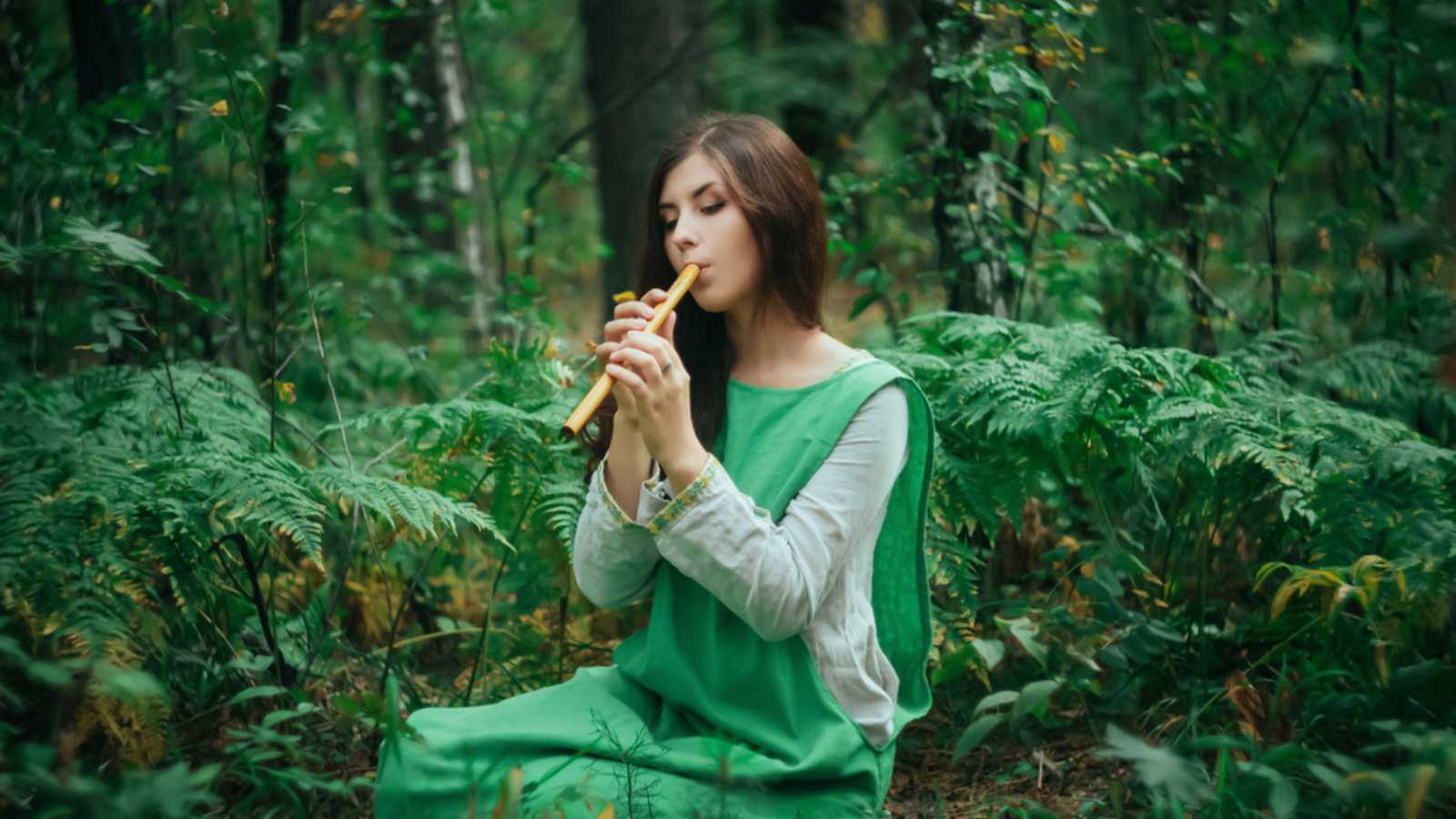 Woman In Forest With Flute