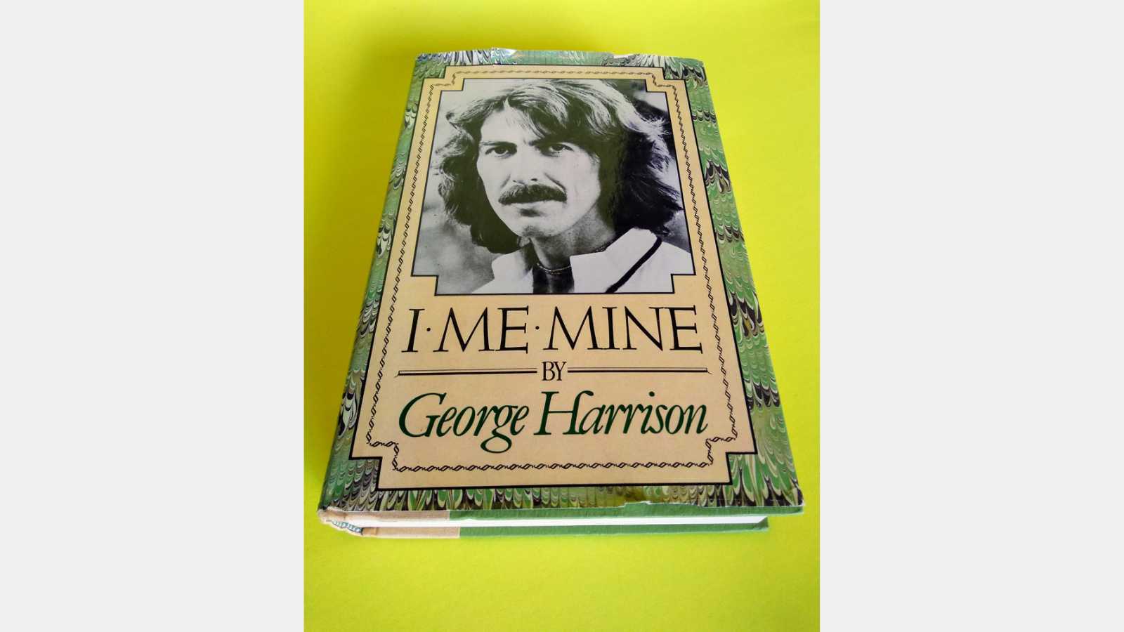 Los Angeles - March 25, 2019: Pages from the book "I, Me, Mine" by Beatle George Harrison show original hand-written notes of song lyrics