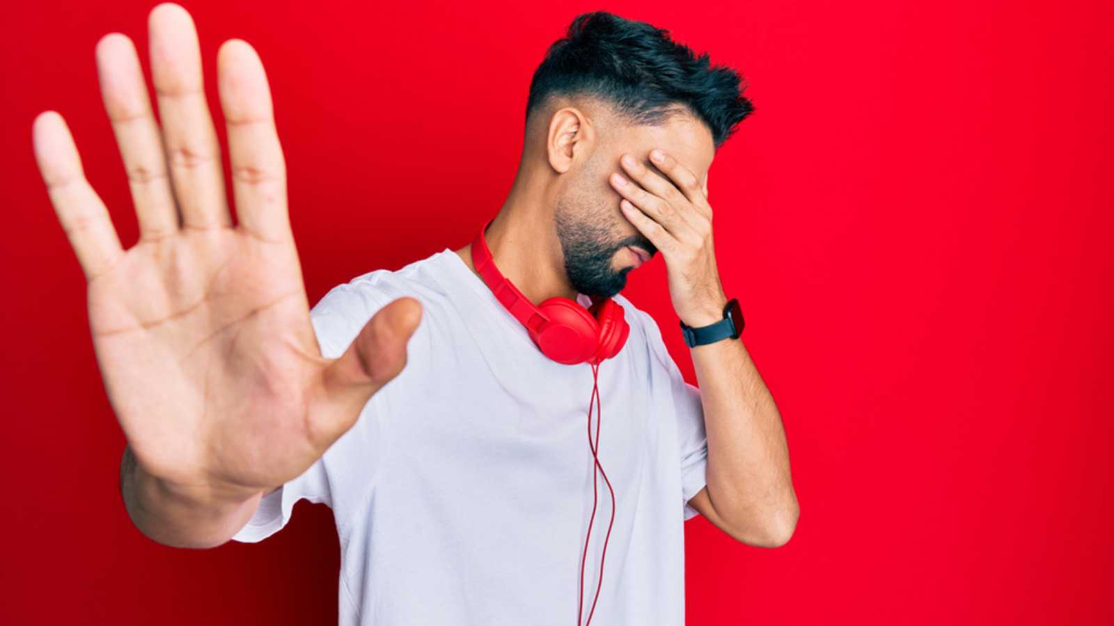 Sad Young Man With Beard Crying