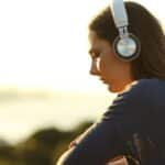 Woman feeling sad with headphones