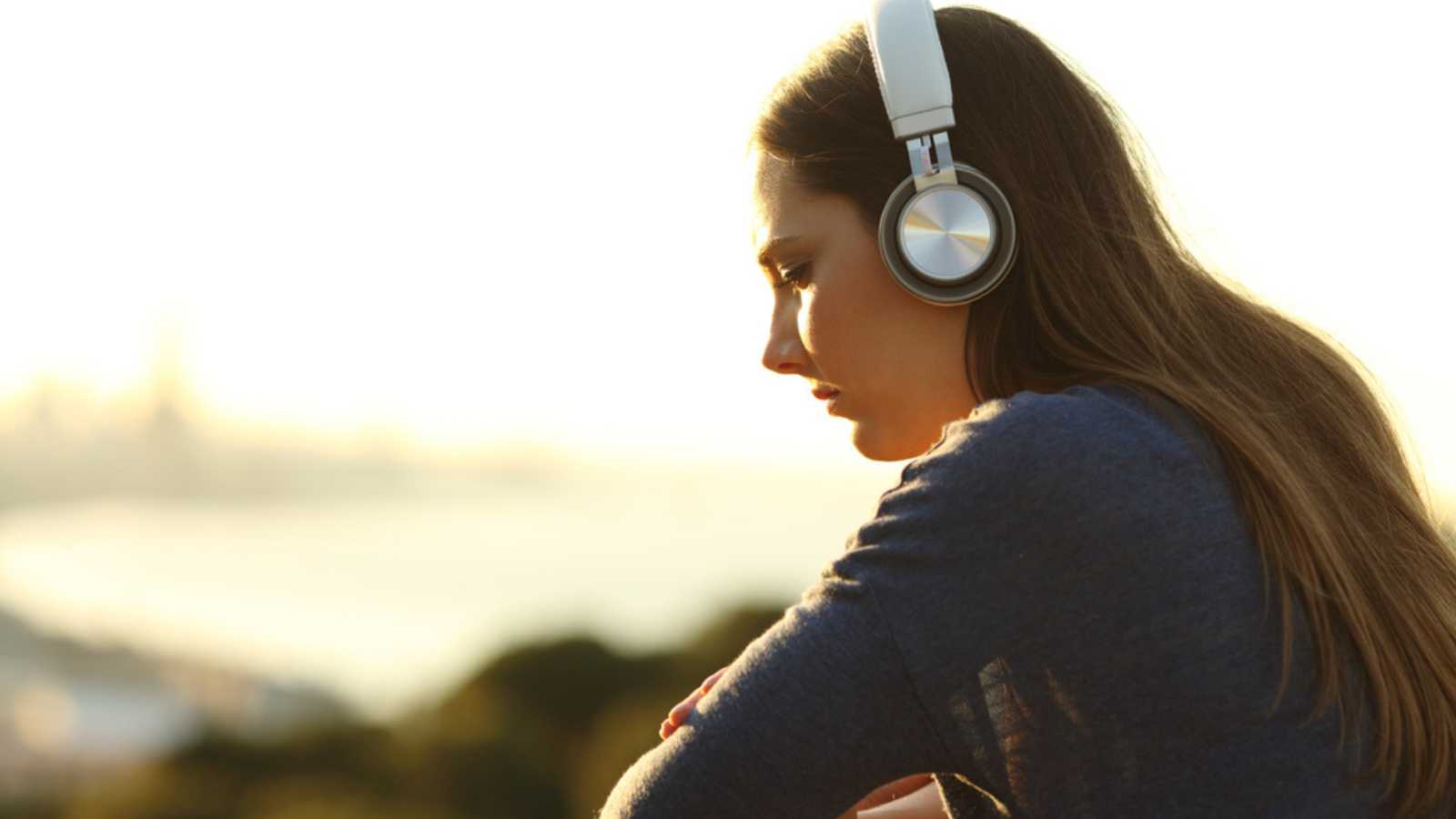 Woman Feeling Sad With Headphones