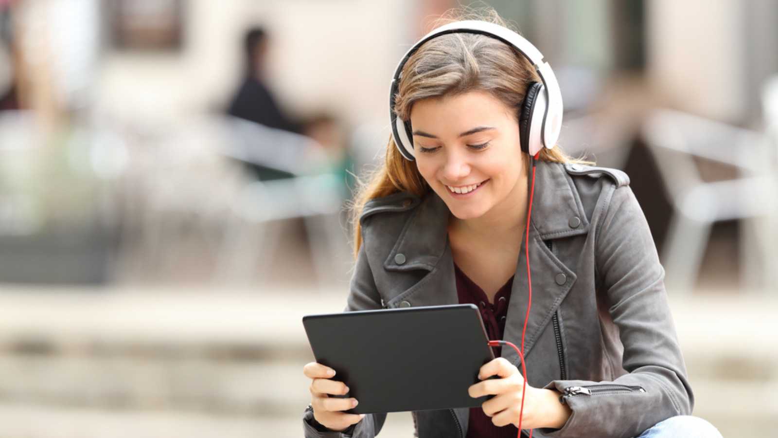 Woman Hearing Song From Ipad