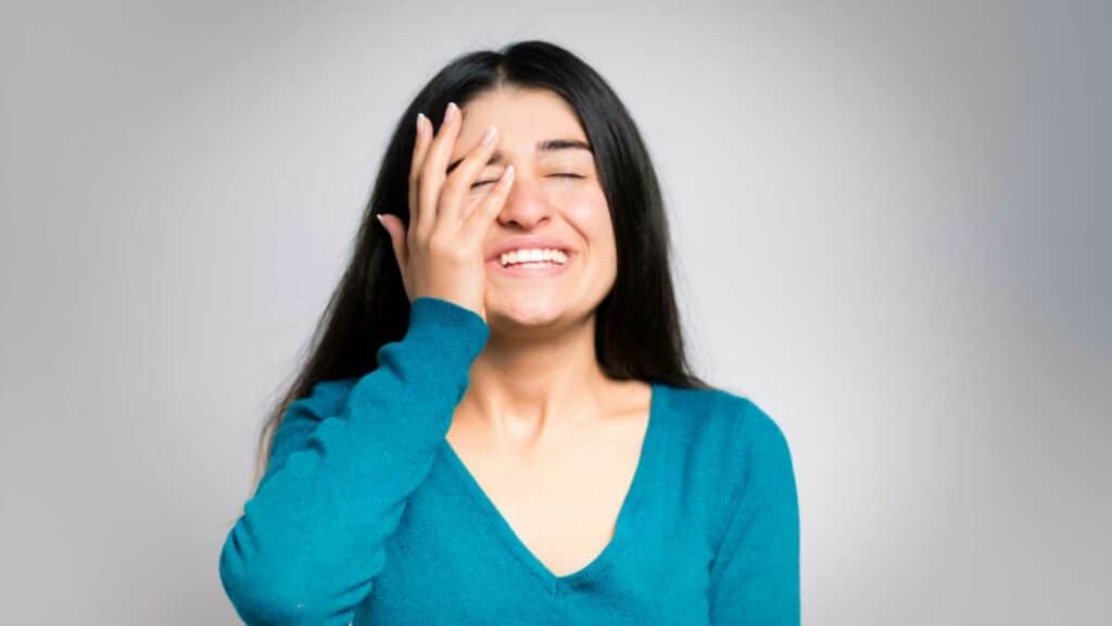Woman Wiping Tears And Feeling Happy
