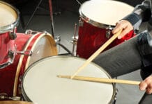 Drummer Playing The Drums Closeup