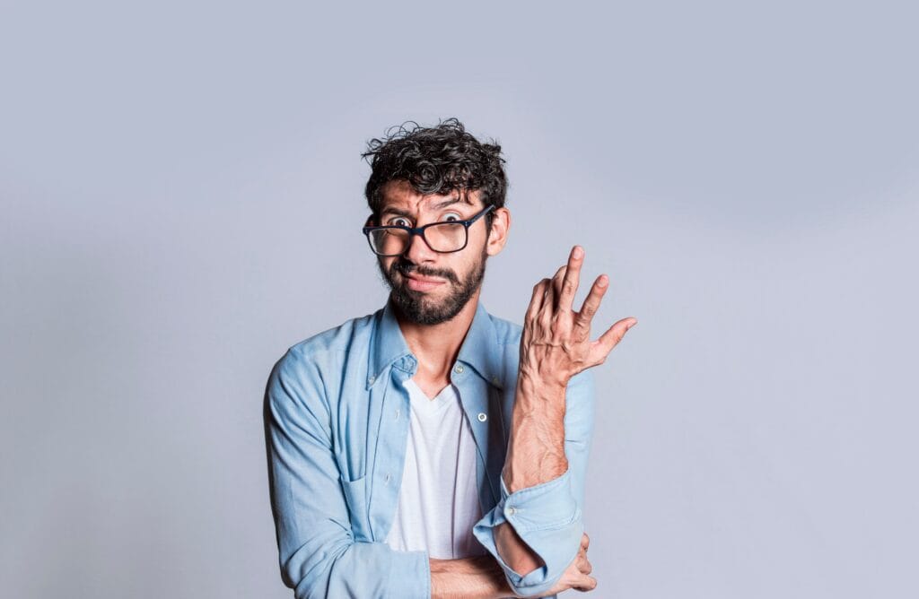 Puzzled Man Gesturing With One Hand Person With Puzzled Face