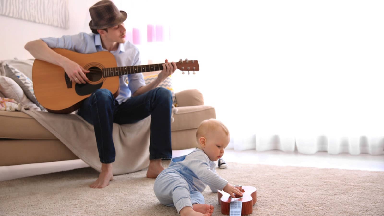 Father Playing Guitar For His Son