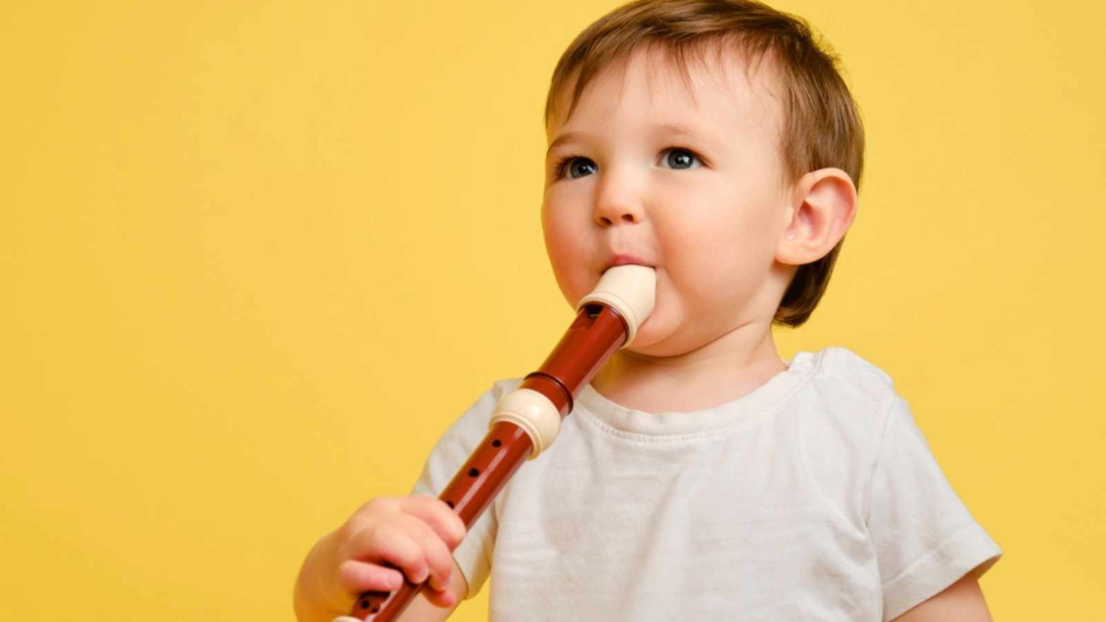 Toddler Playing Flute