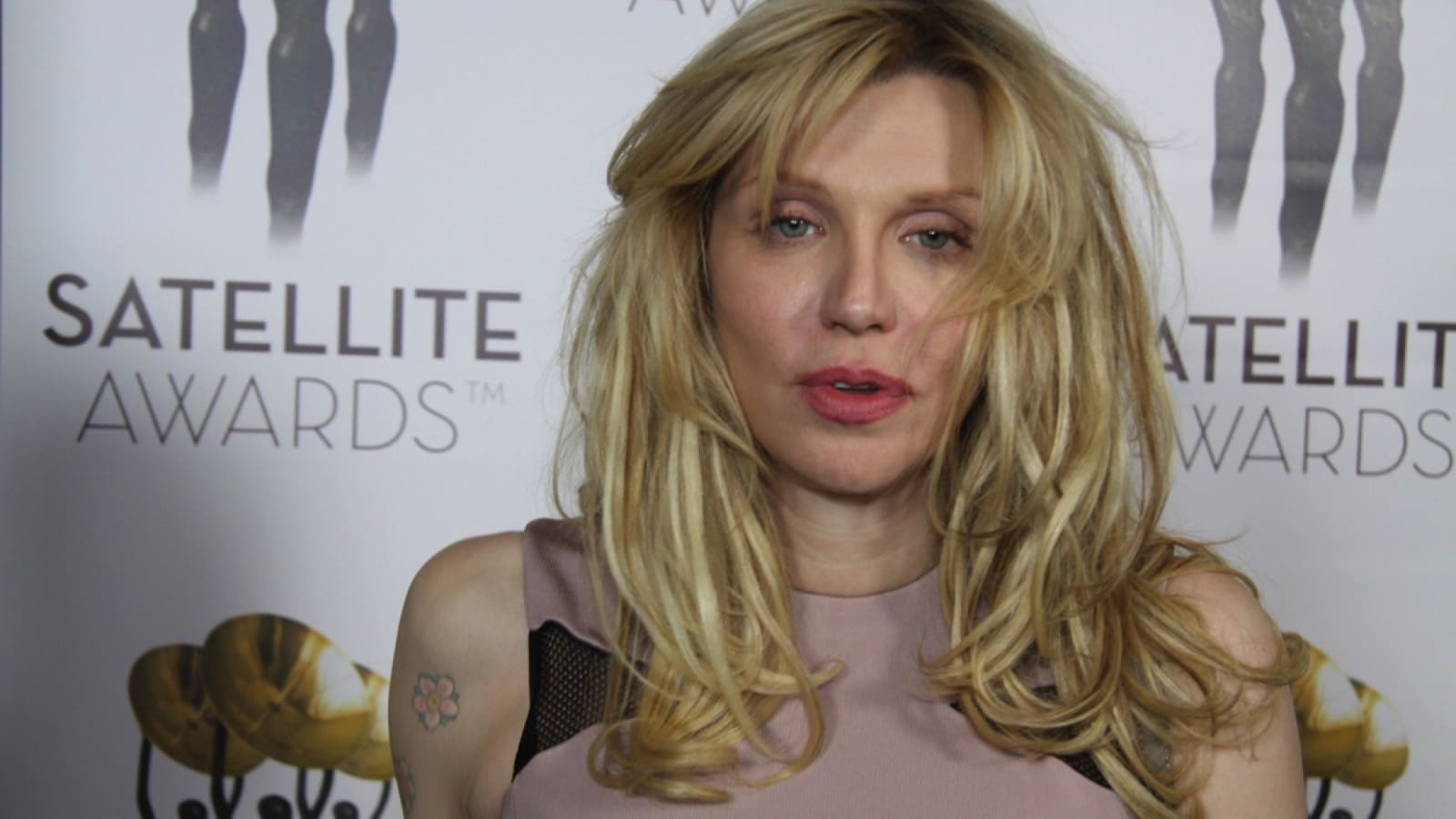 FEBRUARY 23, 2014: Courtney Love arriving at Satellite Awards on February 23, 2014 in Century City, Los Angeles, Ca.