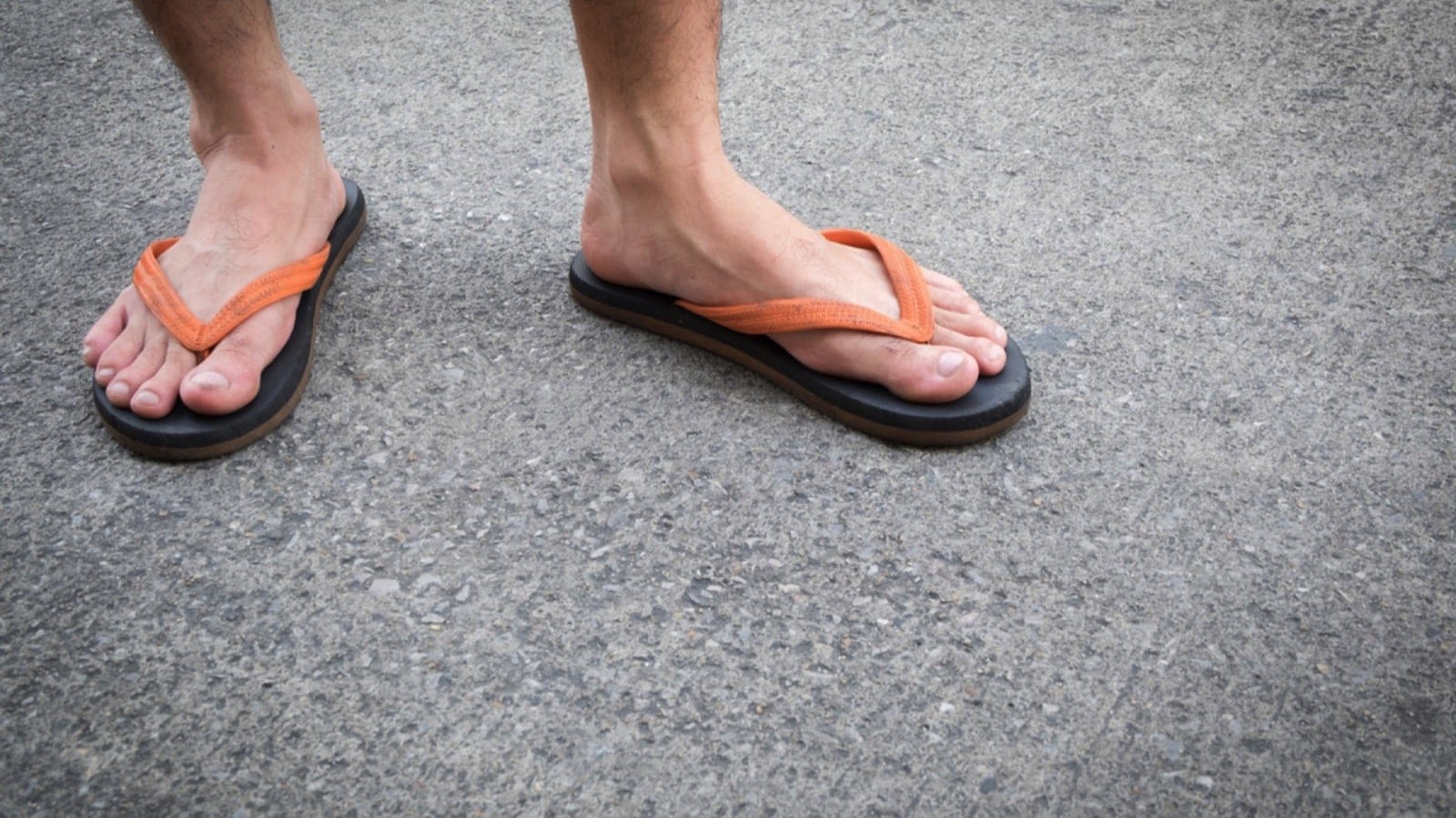 Man Wearing Flip Flops