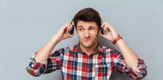 Annoyed Man Hearing Music