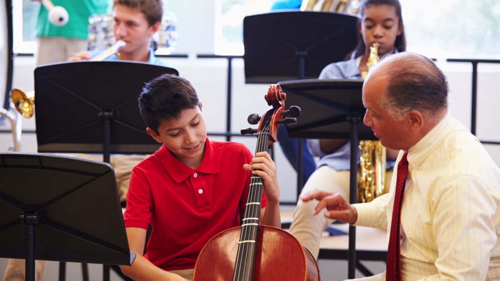 Music Teacher Teaching To Students