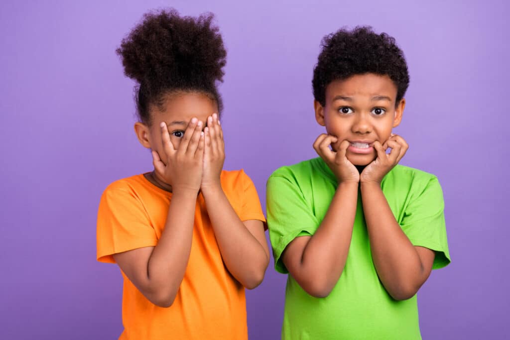 Photo Of Two Young Little Afro Kids Worried Scared Horrified